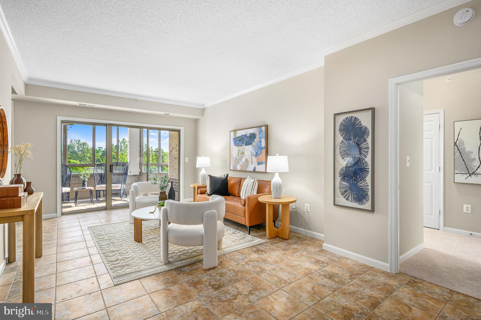 19375 Cypress Ridge Terrace, Unit 114 Leesburg, VA 20176 - Photo 2 of 42 a living room with furniture and a large window