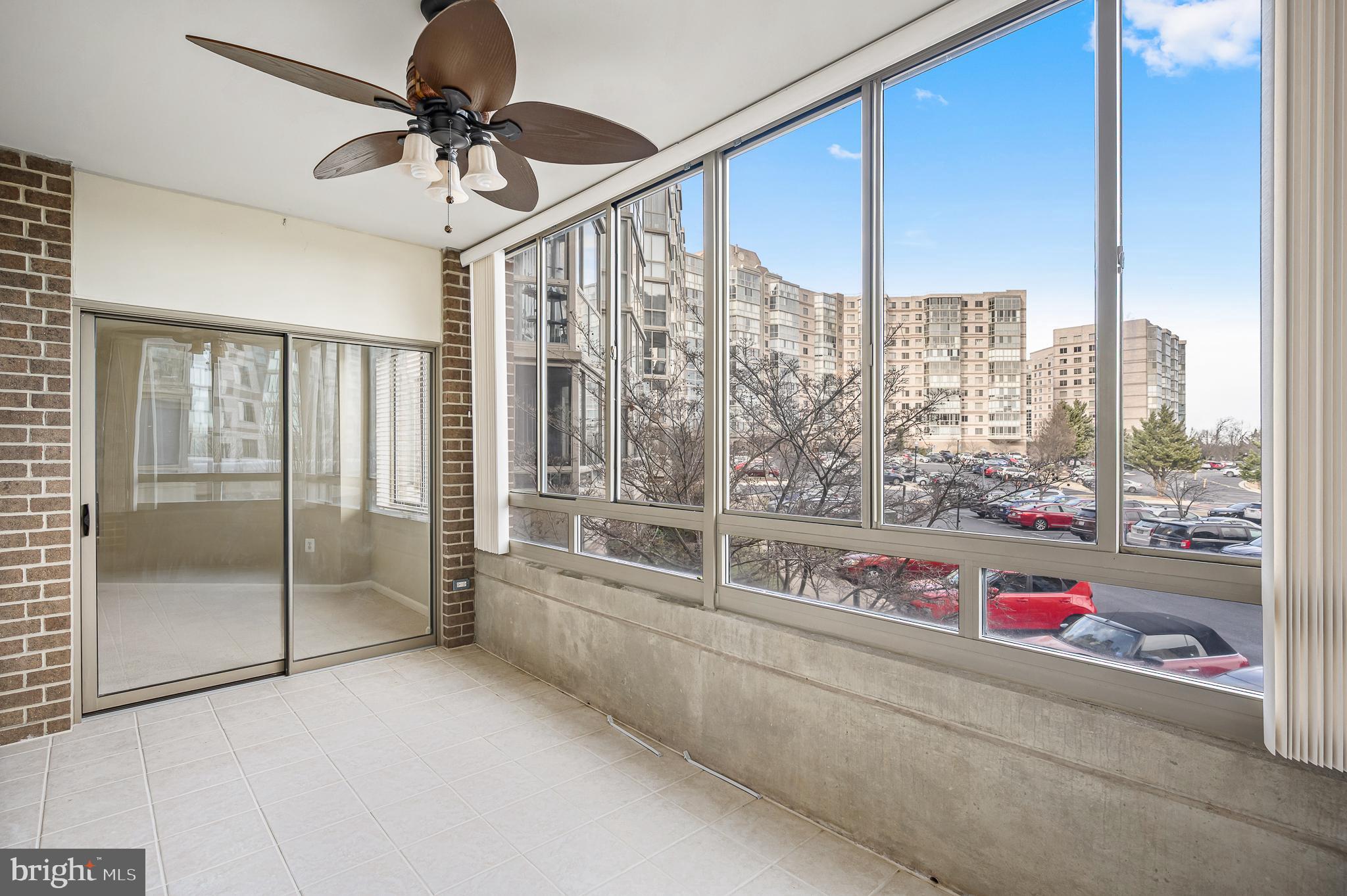 19375 Cypress Ridge Terrace, Unit 114 Leesburg, VA 20176 - Photo 28 of 41 Sunroom