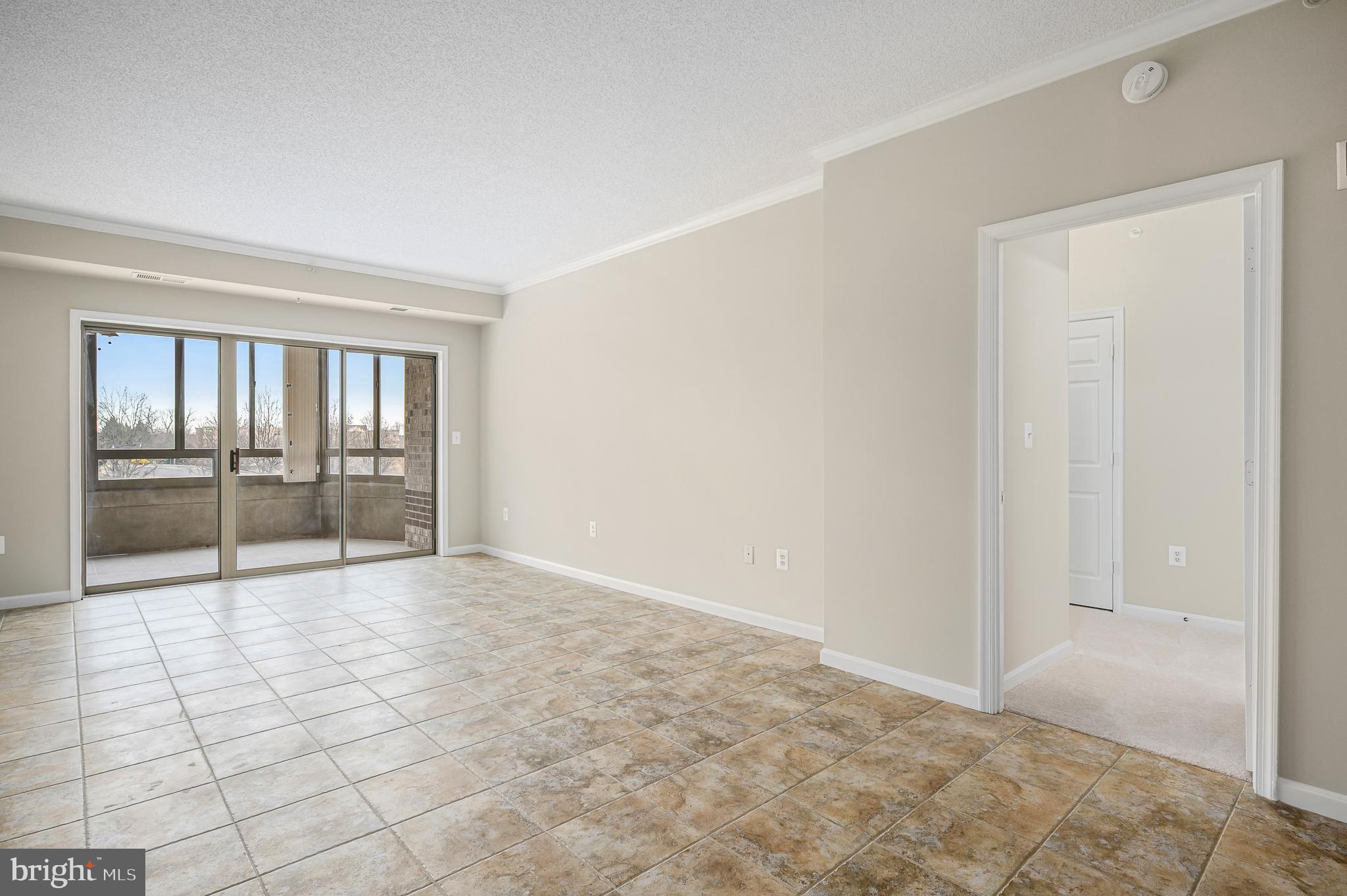 19375 Cypress Ridge Terrace, Unit 114 Leesburg, VA 20176 - Photo 3 of 41 Ceramic Tile throughout living/dining areas