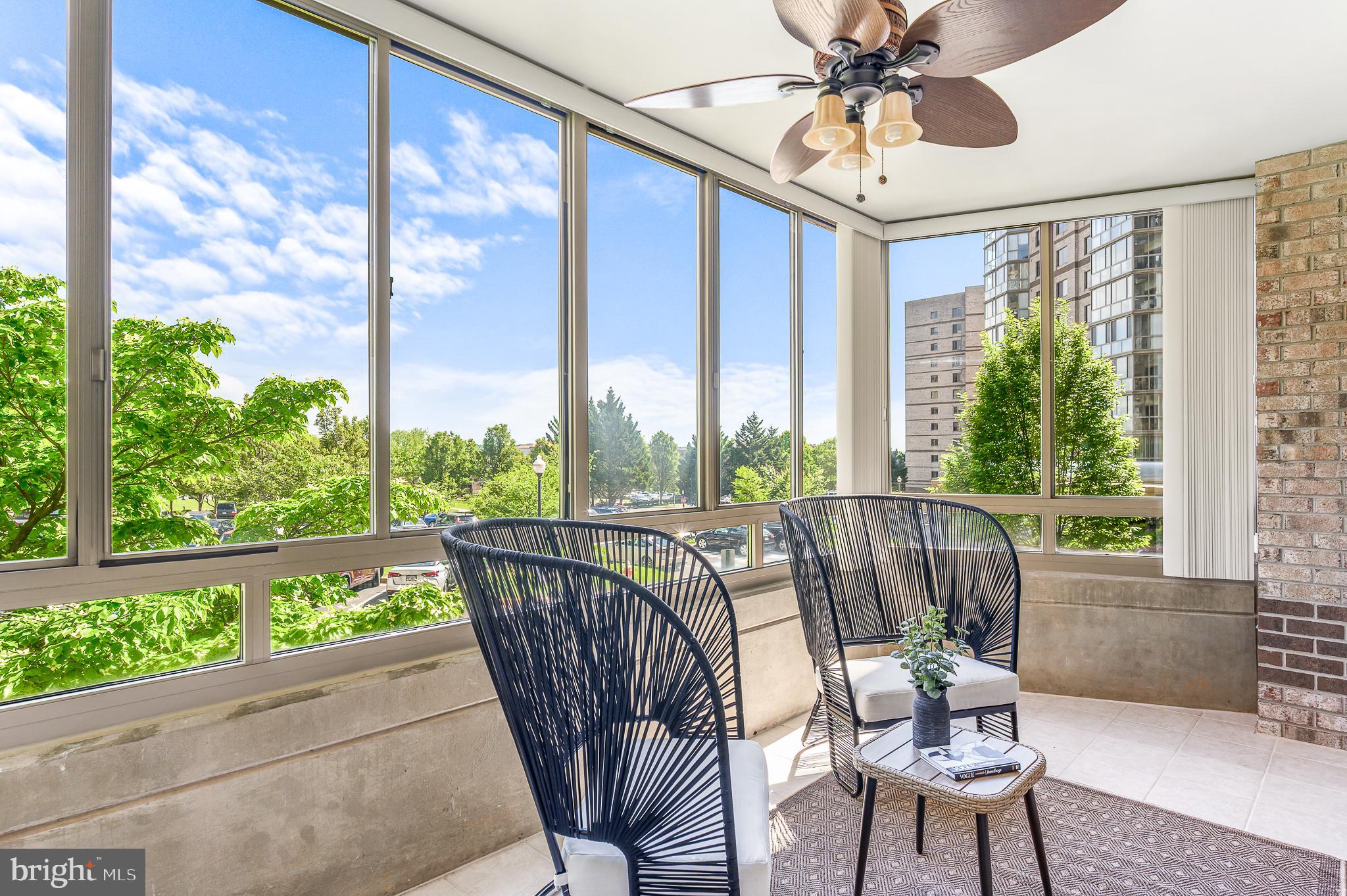 19375 Cypress Ridge Terrace, Unit 114 Leesburg, VA 20176 - Photo 5 of 42 a view of a dining room with furniture window and outside view
