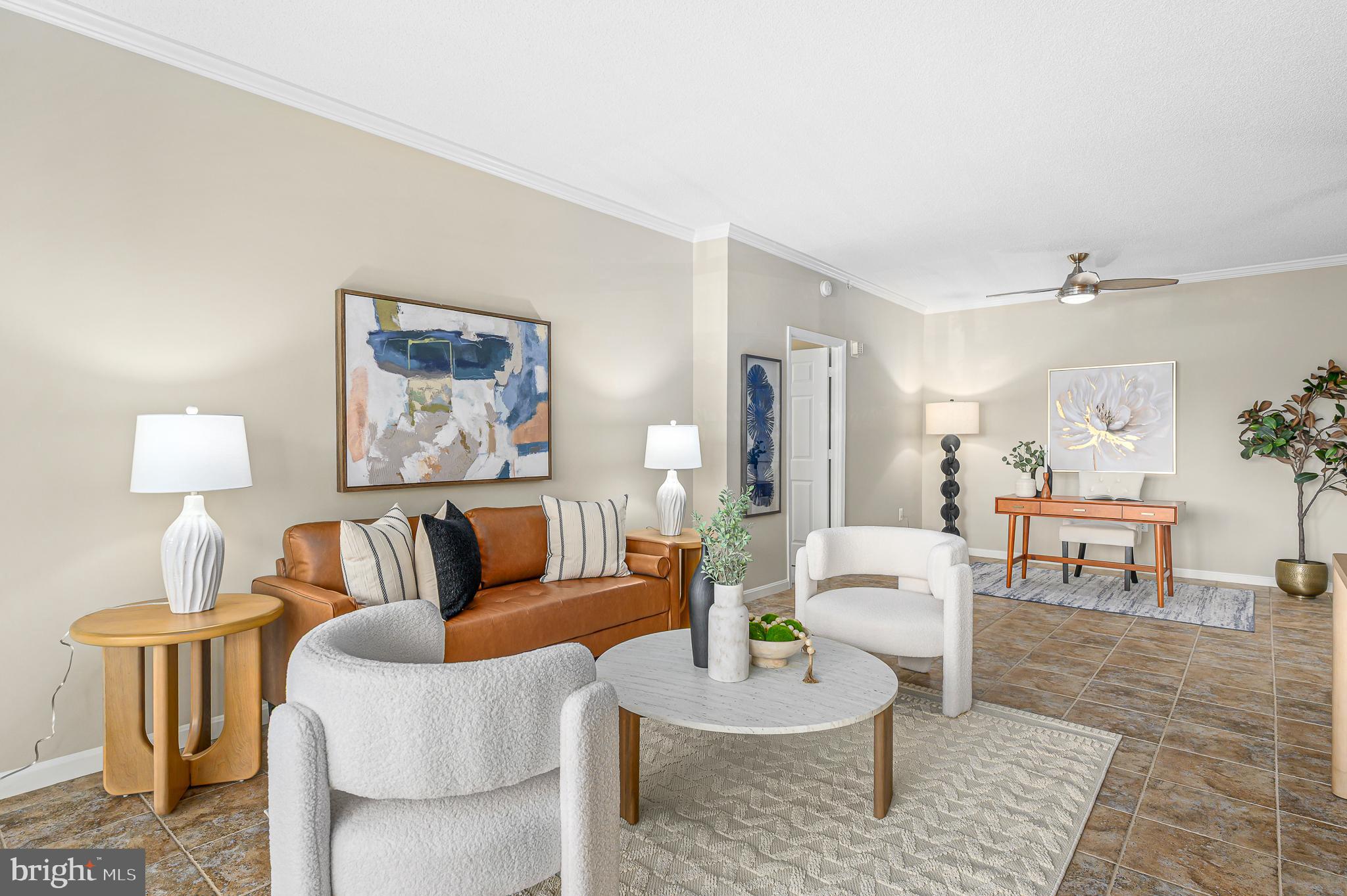 19375 Cypress Ridge Terrace, Unit 114 Leesburg, VA 20176 - Photo 7 of 42 a living room with furniture and wooden floor