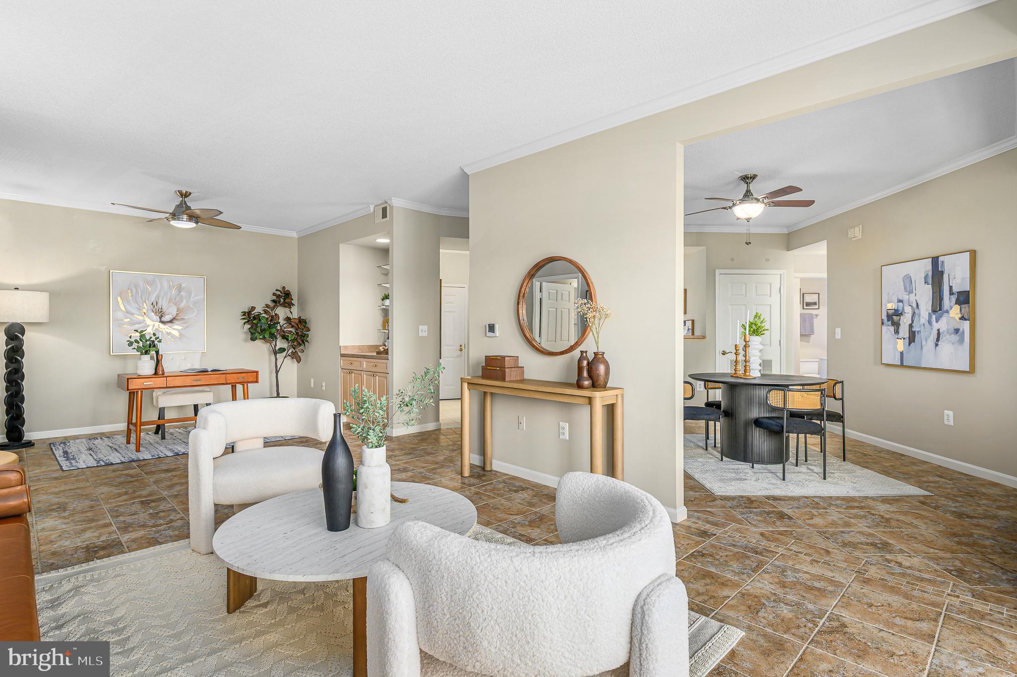 19375 Cypress Ridge Terrace, Unit 114 Leesburg, VA 20176 - Photo 8 of 42 a living room with furniture a mirror and a table