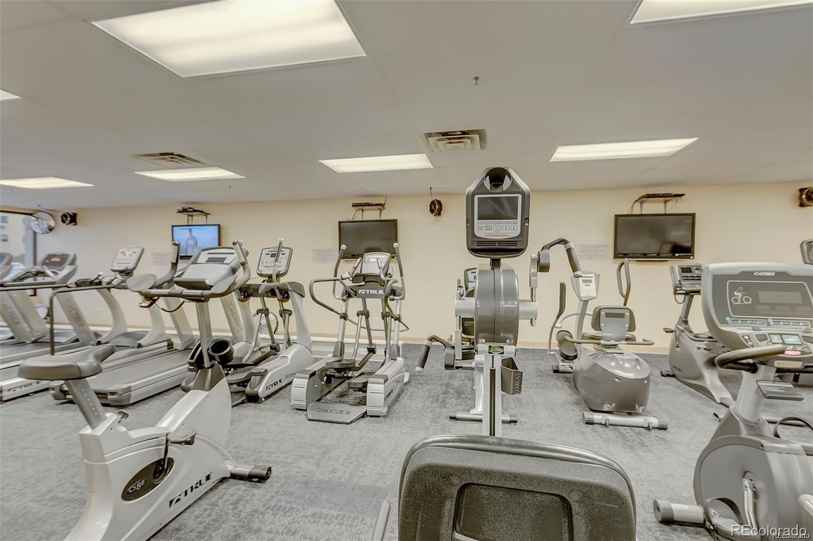 680 South Alton Way, Unit 9B Denver, CO 80247 - Photo 21 of 31 a view of a room with gym equipment