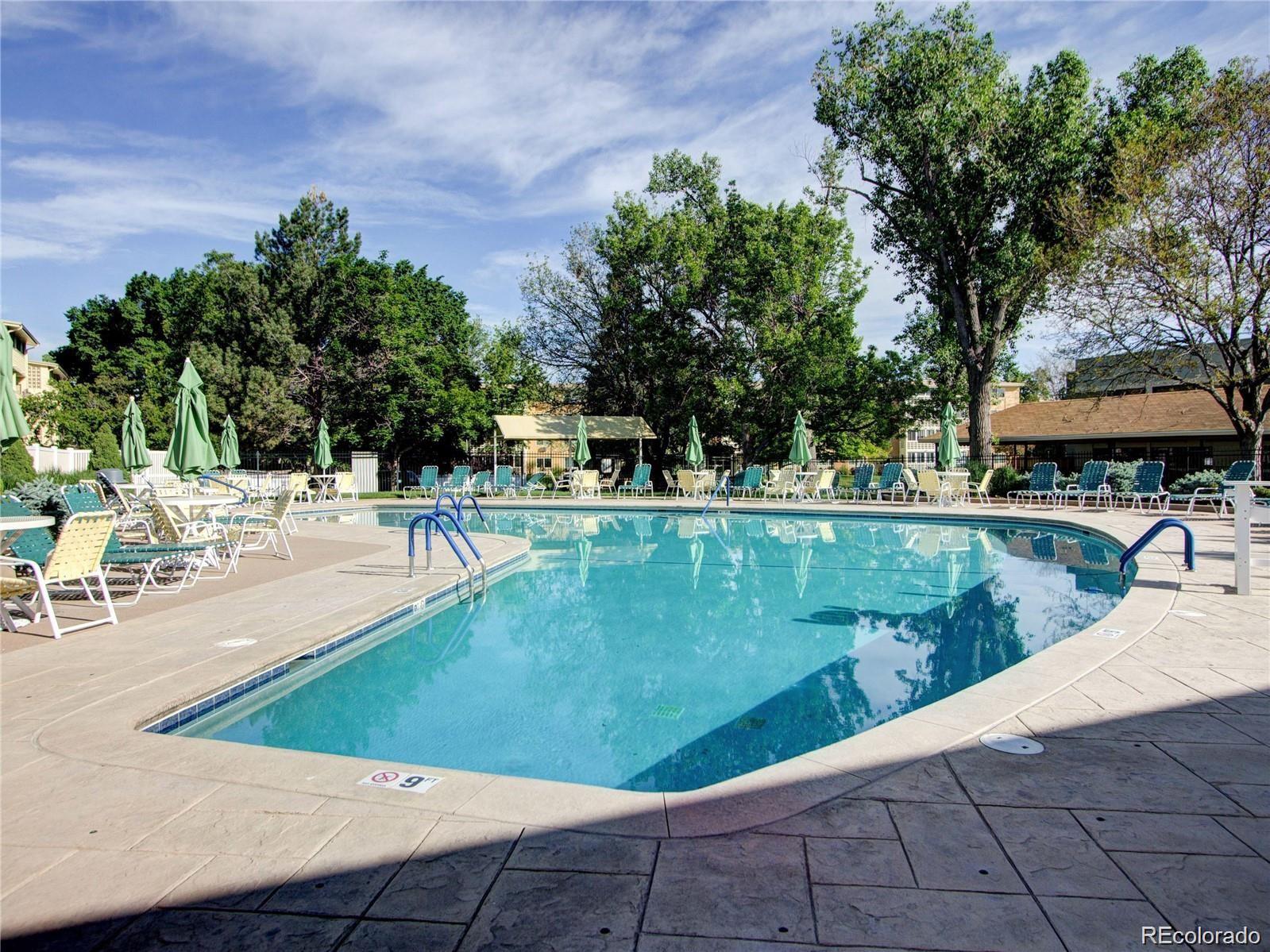 680 South Alton Way, Unit 9B Denver, CO 80247 - Photo 23 of 31 a view of a swimming pool with a patio