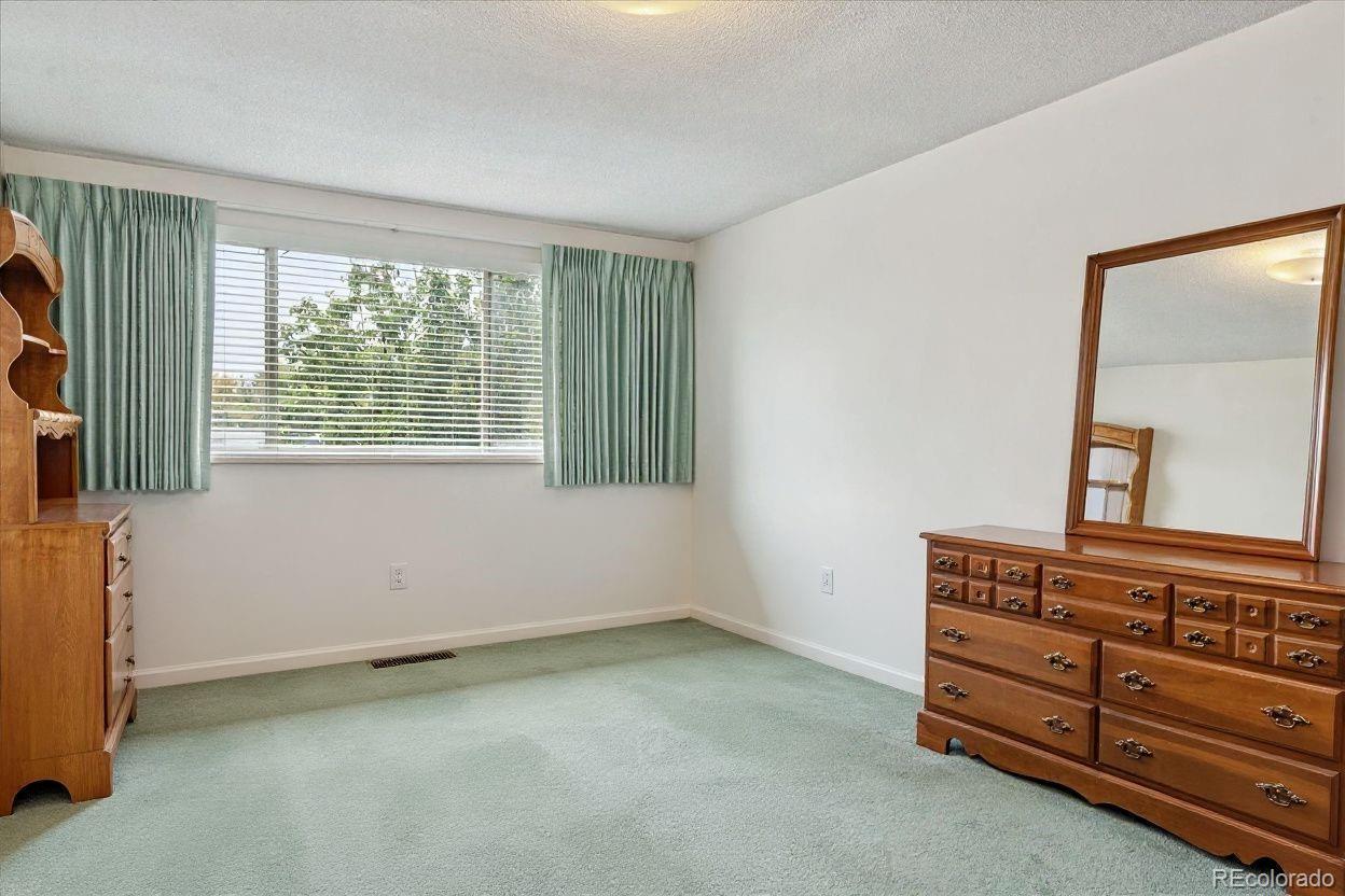 680 South Alton Way, Unit 9B Denver, CO 80247 - Photo 9 of 31 a view of a room with window