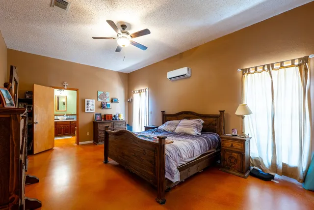a bathroom with a sink a mirror and a bathtub