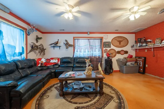 a bathroom with a toilet a sink and a mirror