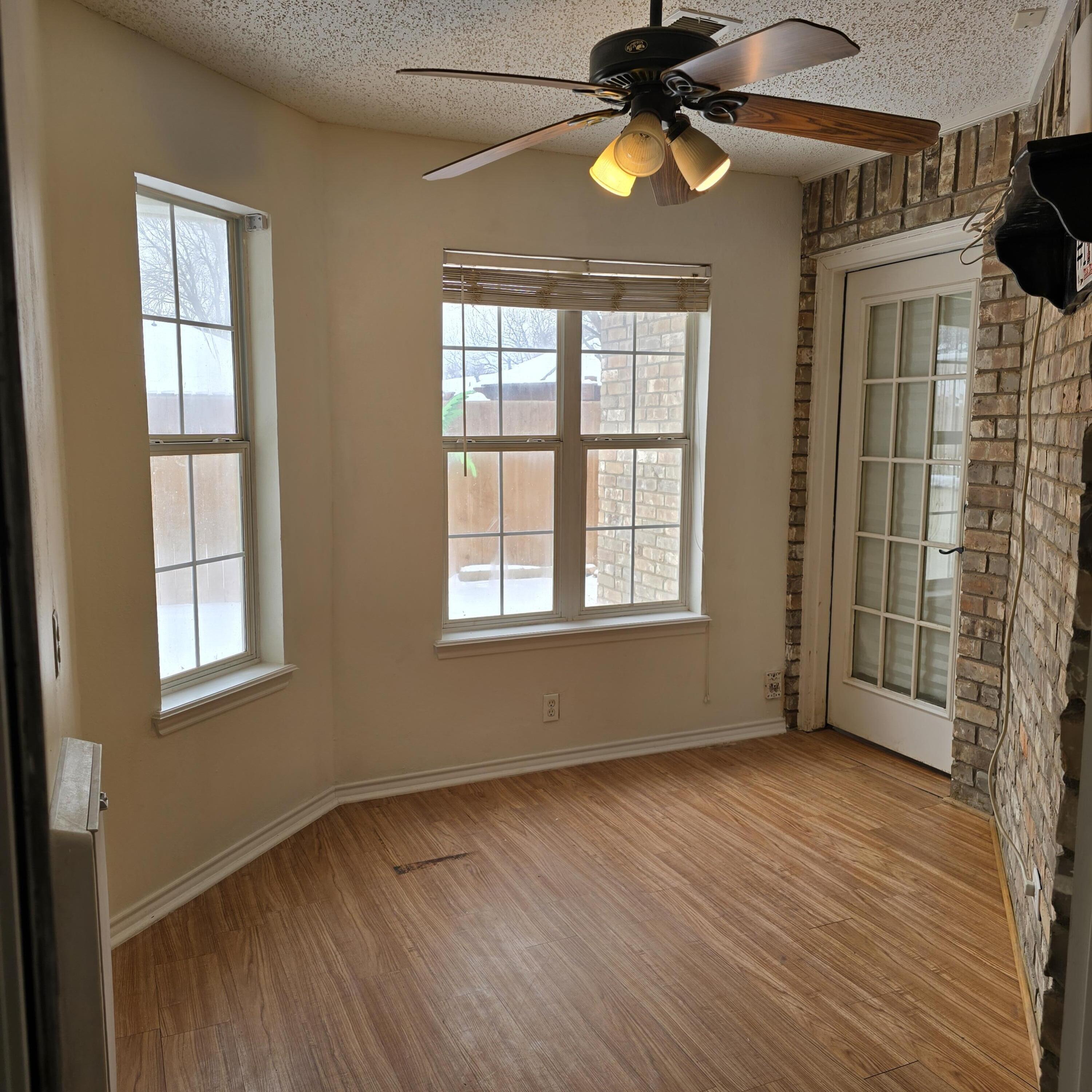6701 Chicago Avenue Lubbock, TX 79424 - Photo 15 of 35 Small Flex Room with doggy door