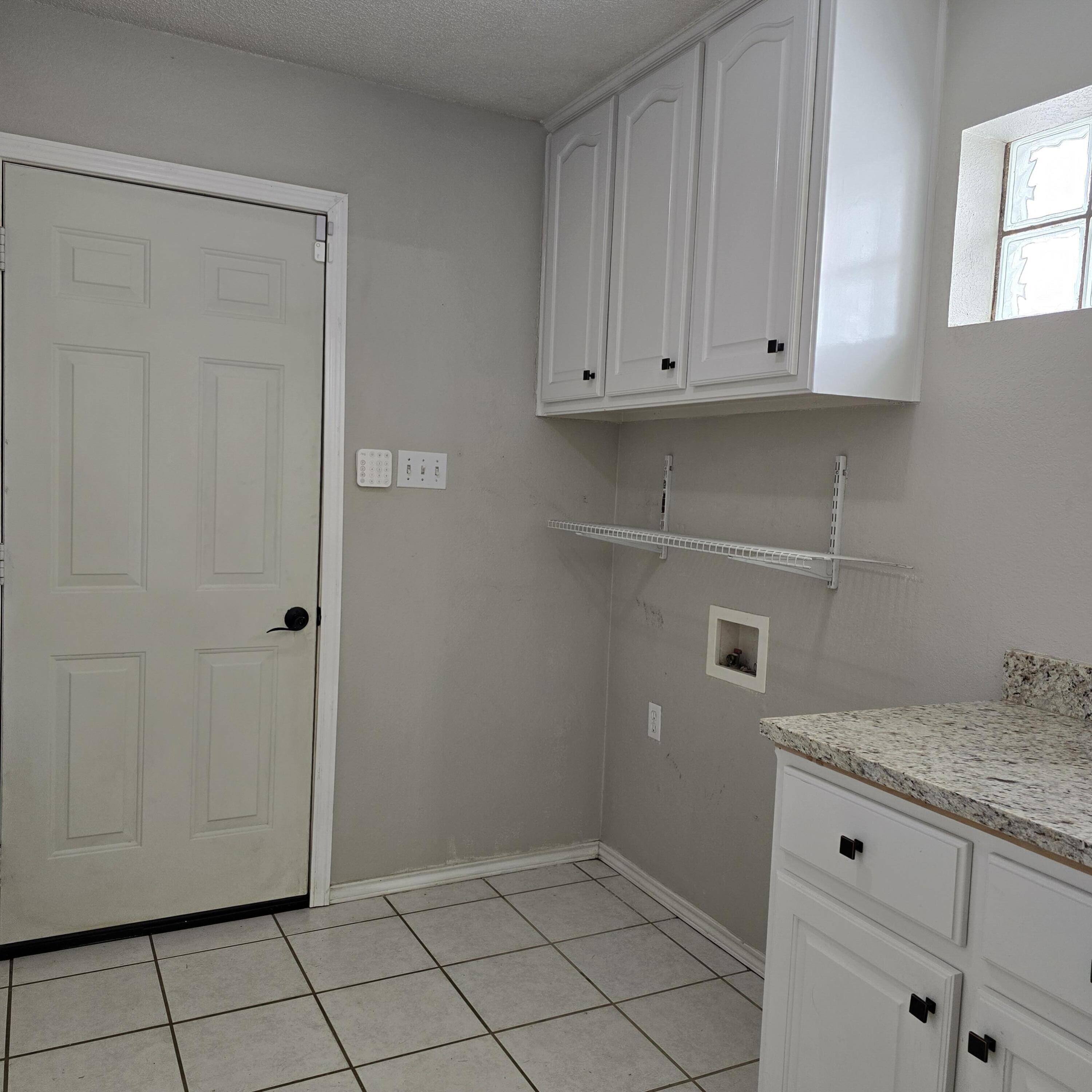 6701 Chicago Avenue Lubbock, TX 79424 - Photo 25 of 35 a view white cabinets