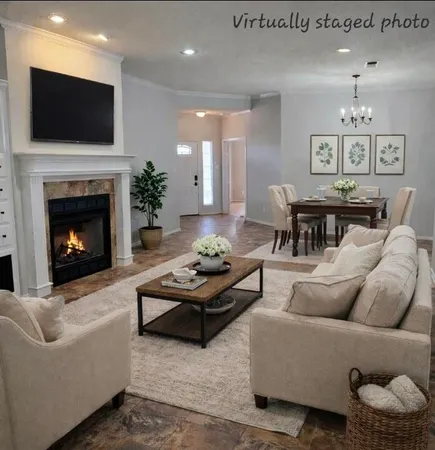 a view of an empty room with a fireplace