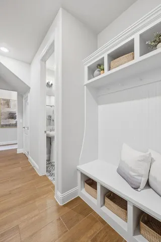 a view of kitchen and wooden floor