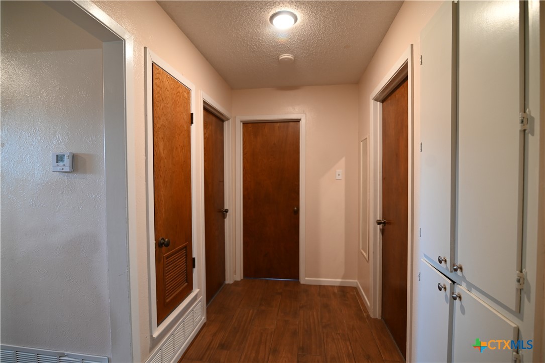 618 Allen Street Copperas Cove, TX 76522 - Photo 18 of 31 Hallway between the two secondary bedrooms