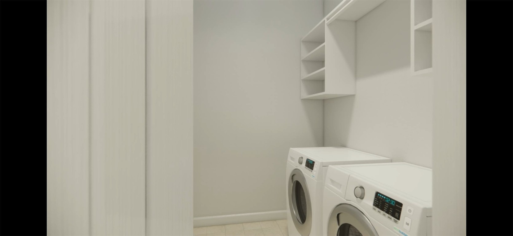 507 Algaroba Loop Buda, TX 78610 - Photo 10 of 39 a utility room with dryer and washer