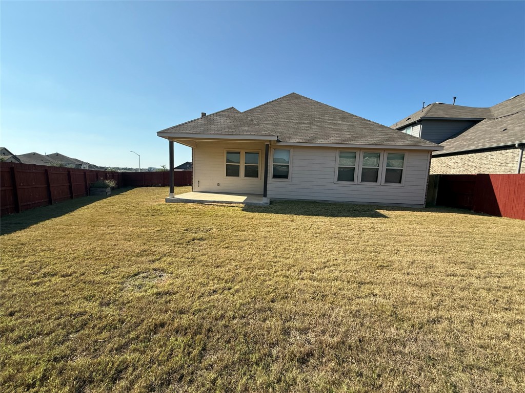 507 Algaroba Loop Buda, TX 78610 - Photo 35 of 39 a house view with a garden space