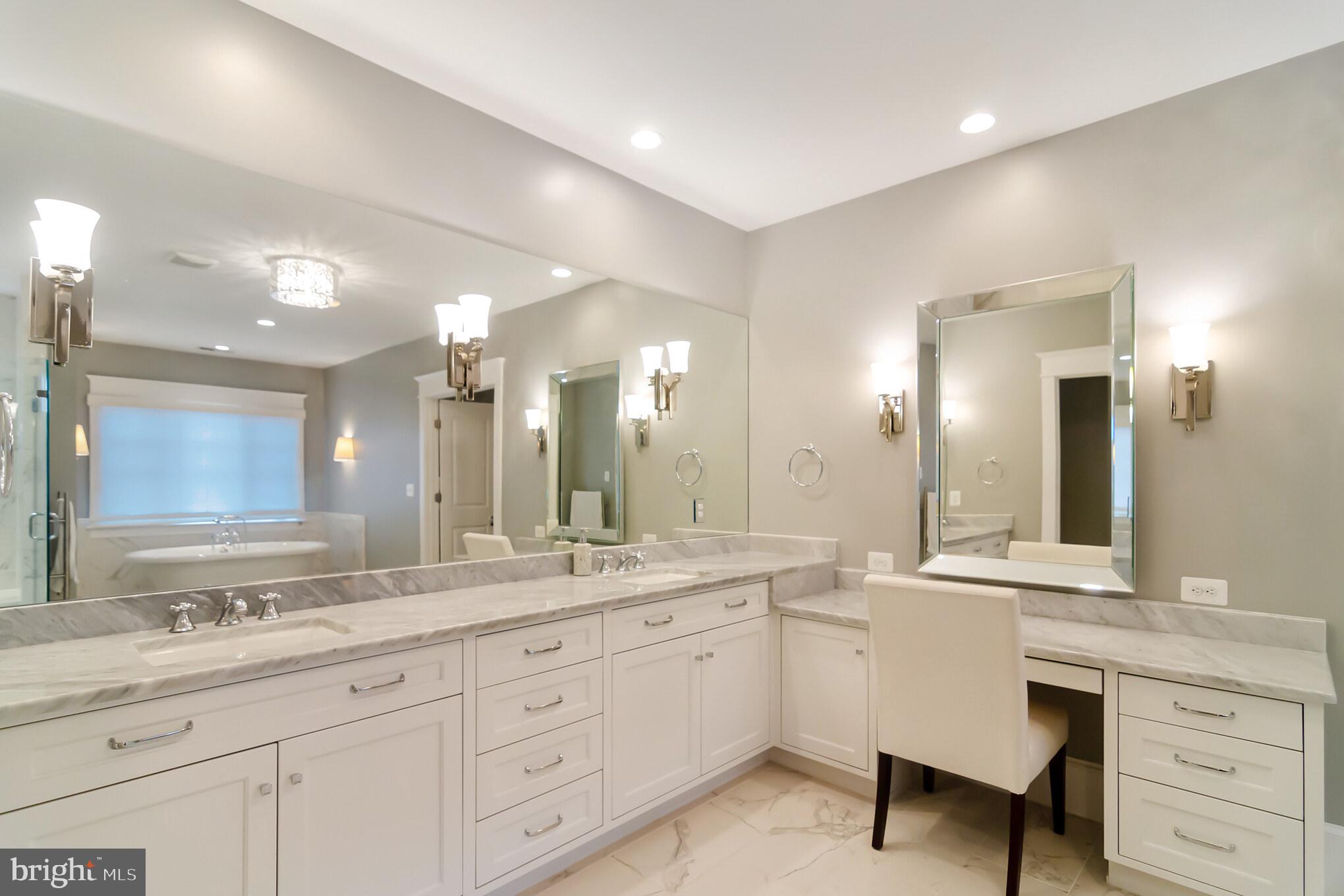 6801 Danforth Street McLean, VA 22101 - Photo 20 of 29 a bathroom with a granite countertop sink mirror and double