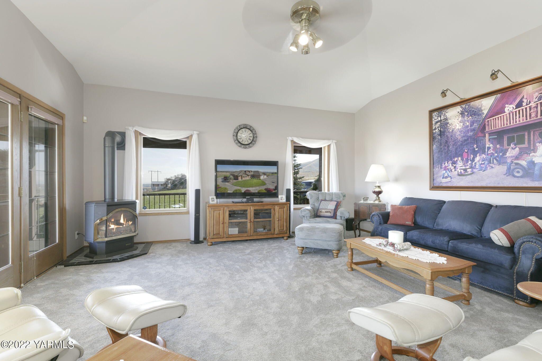 631 Meadowbrook Road Yakima, WA 98903 - Photo 12 of 29 a living room with furniture and a large window