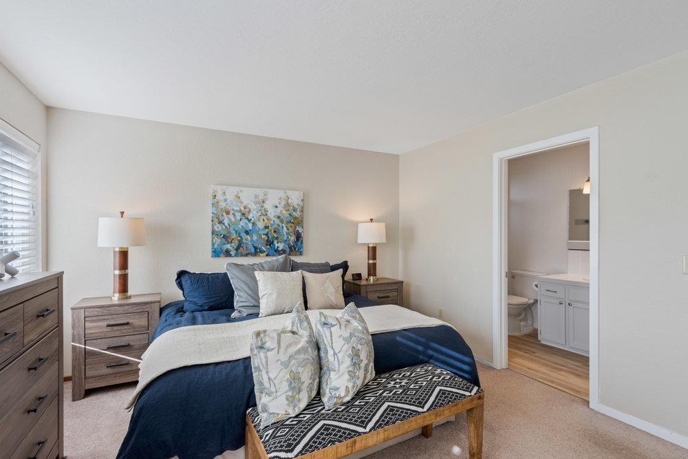 315 Kessler Way Ben Lomond, CA 95005 - Photo 17 of 50 a bedroom with a bed and wooden floor