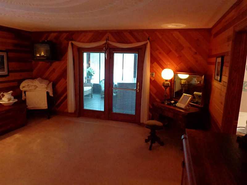 2677 Ridge Road Hooversville, PA 15936 - Photo 12 of 25 Master Bedroom. Master bedroom entry to sunroom