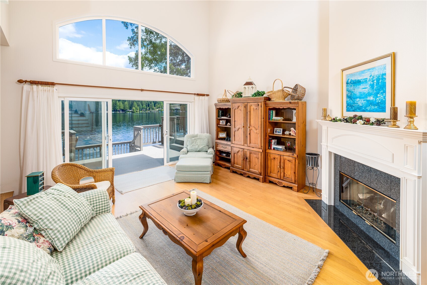 33571 Cliff Road Mount Vernon, WA 98274 - Photo 13 of 38 a living room with furniture a fireplace and a large window