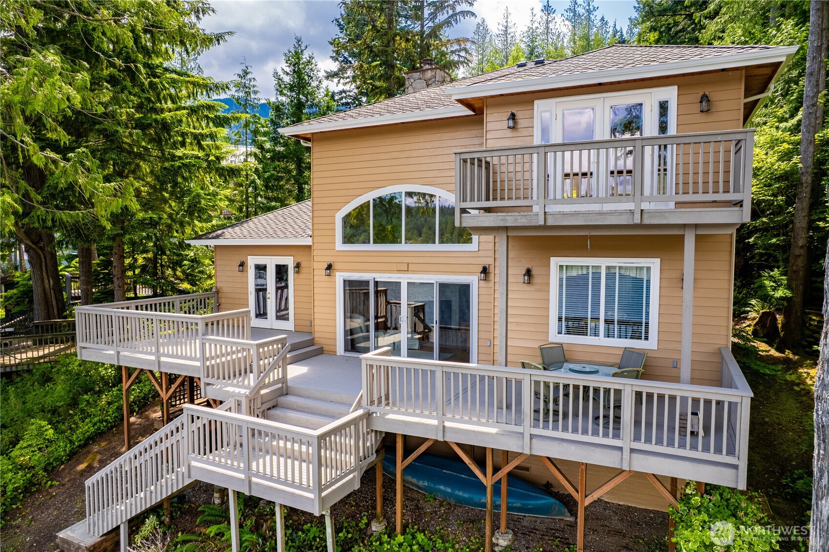 33571 Cliff Road Mount Vernon, WA 98274 - Photo 30 of 38 a view of a house with a deck and furniture