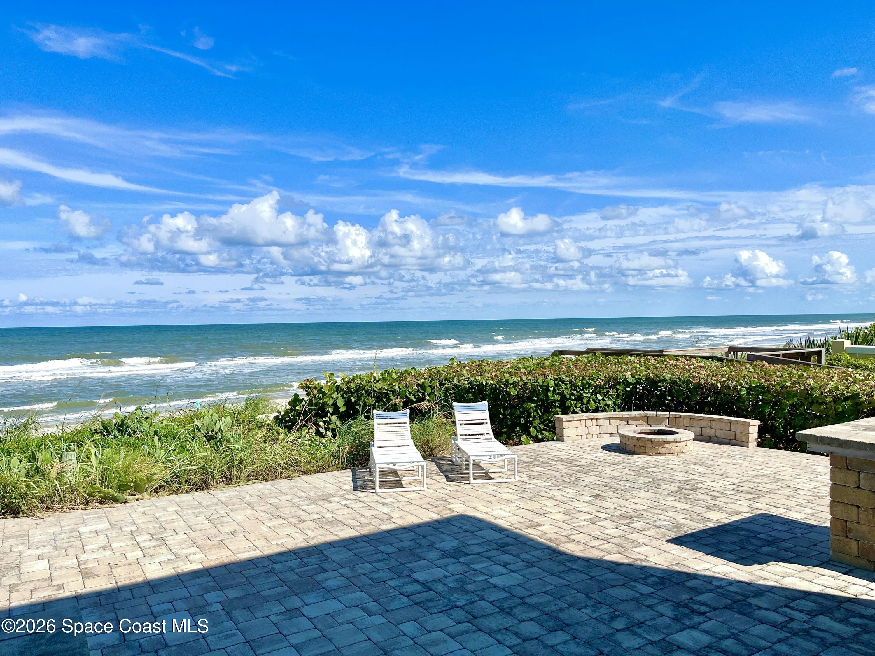 799 Shell Street Satellite Beach, FL 32937 - Photo 29 of 32 a view of a lake with a big yard