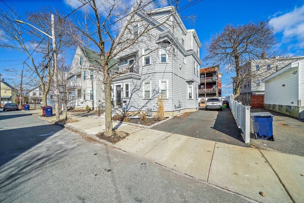 11 Mason Street, Unit 2 Everett, MA 02149 - Photo 22 of 28 a view of a building with a street