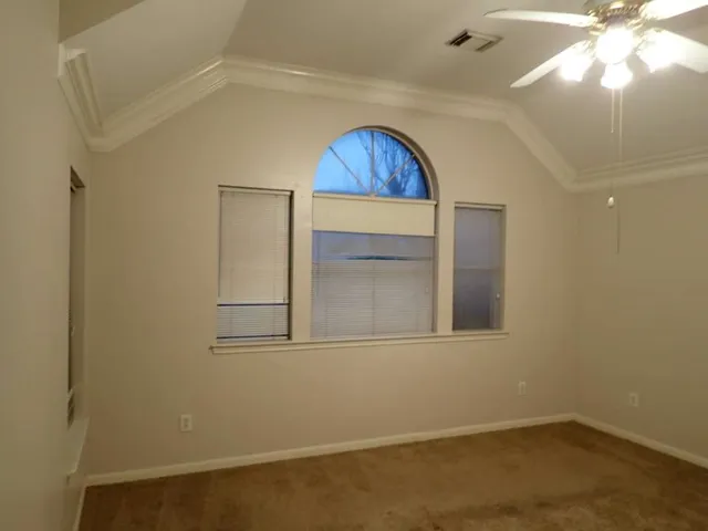 a view of yard from a corridor