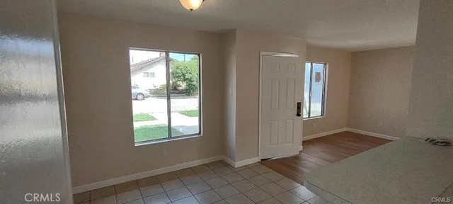 an empty room with windows