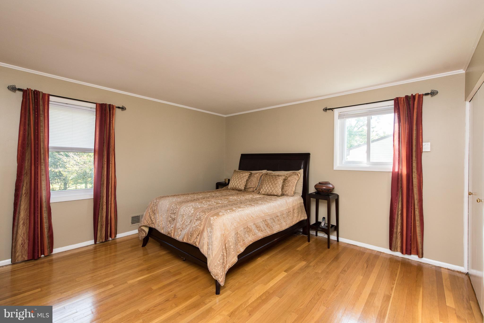 3921 Sybil Road Randallstown, MD 21133 - Photo 14 of 30 a bedroom with a bed and a window