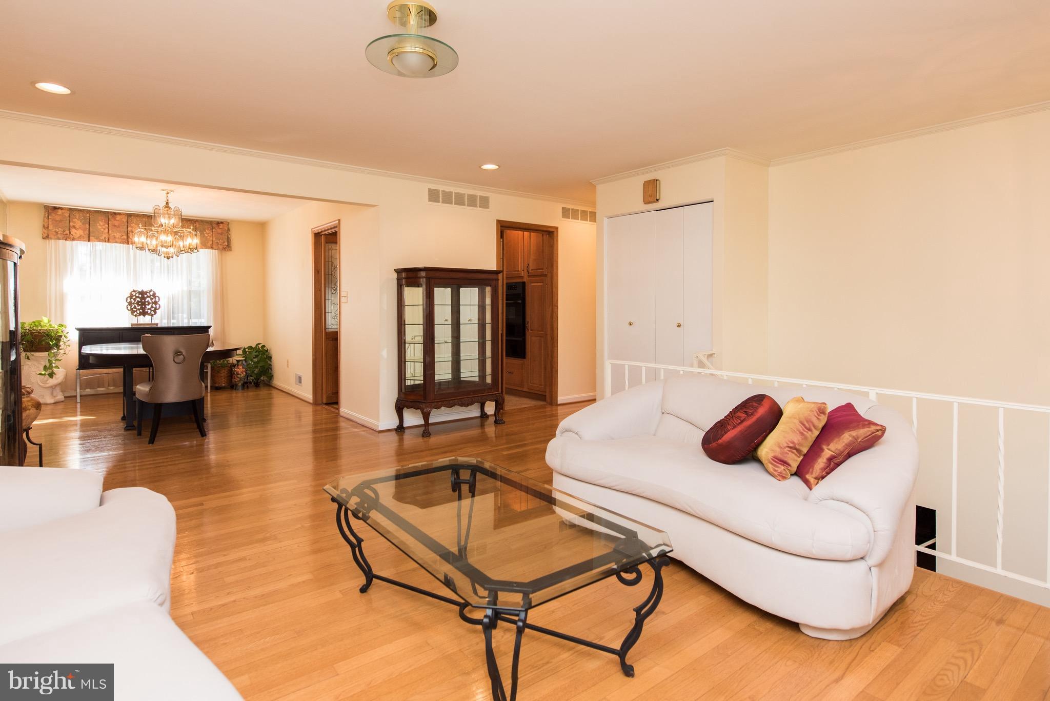 3921 Sybil Road Randallstown, MD 21133 - Photo 3 of 30 a living room with furniture and wooden floor