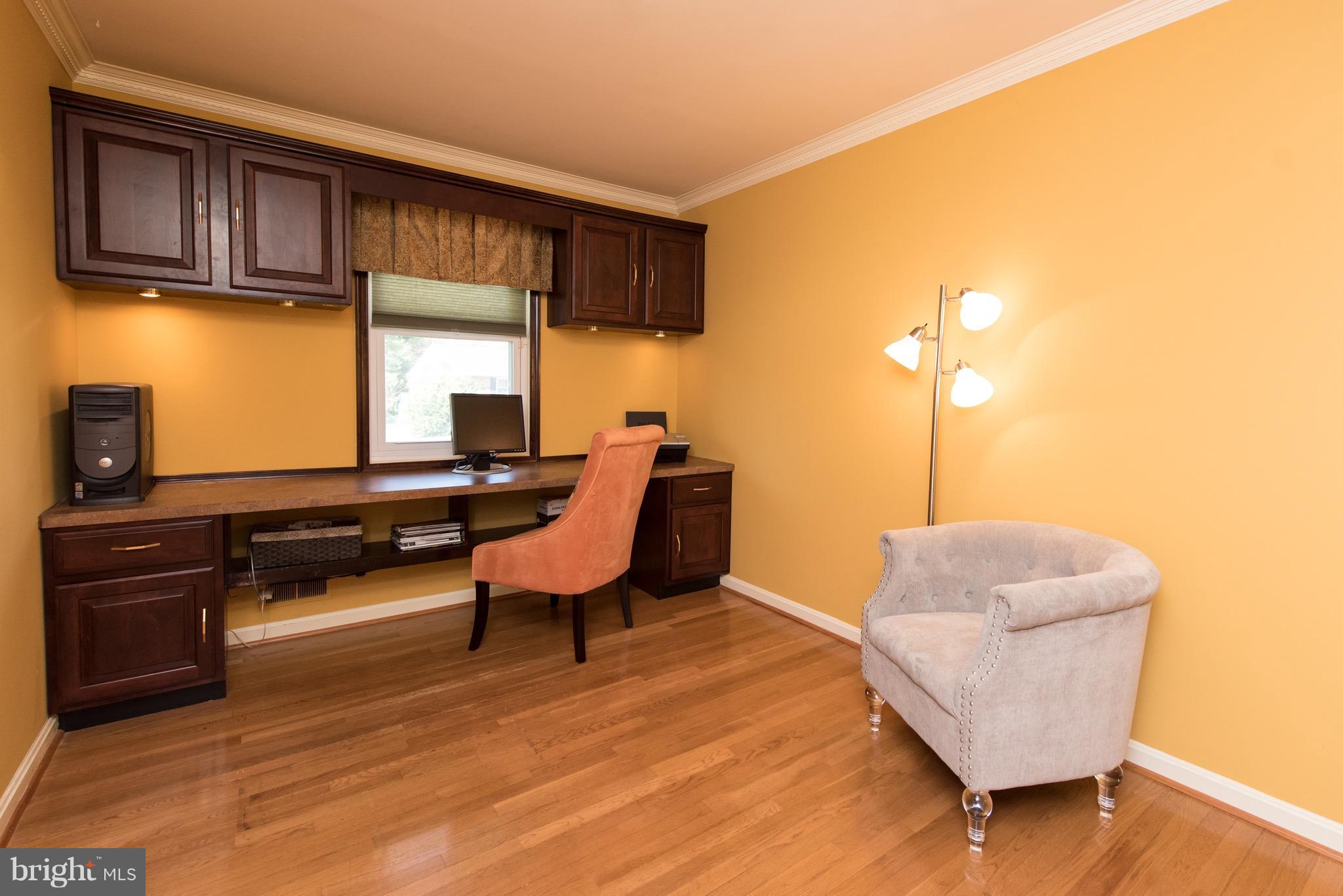 3921 Sybil Road Randallstown, MD 21133 - Photo 22 of 30 a living room with furniture and a wooden floor