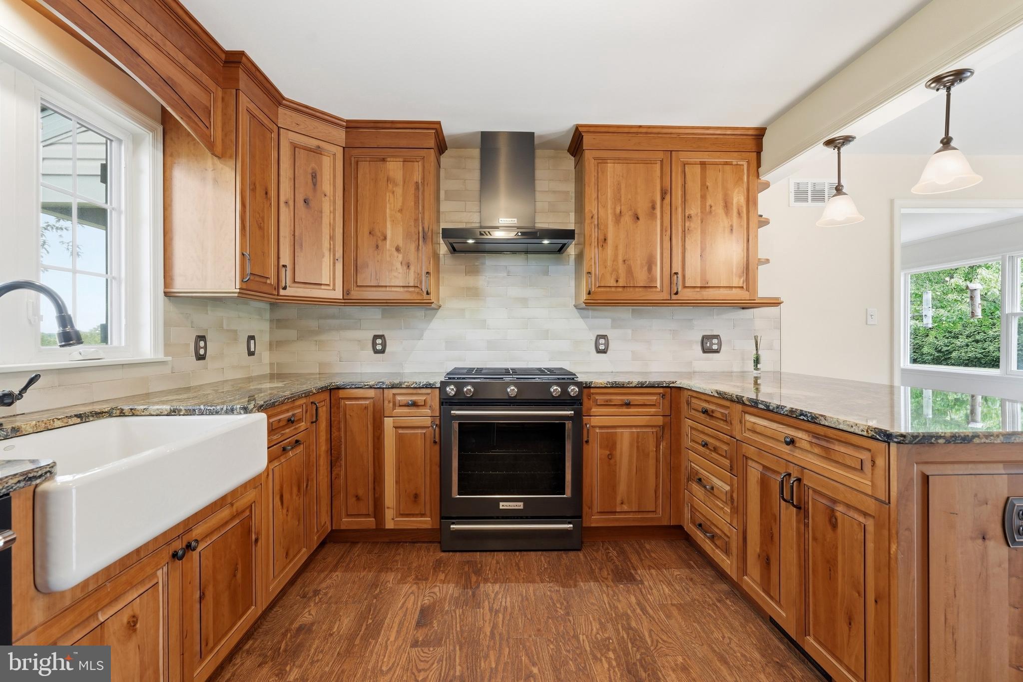 645 Mininger Road Souderton, PA 18964 - Photo 15 of 82 a kitchen with stainless steel appliances granite countertop a stove sink and cabinets