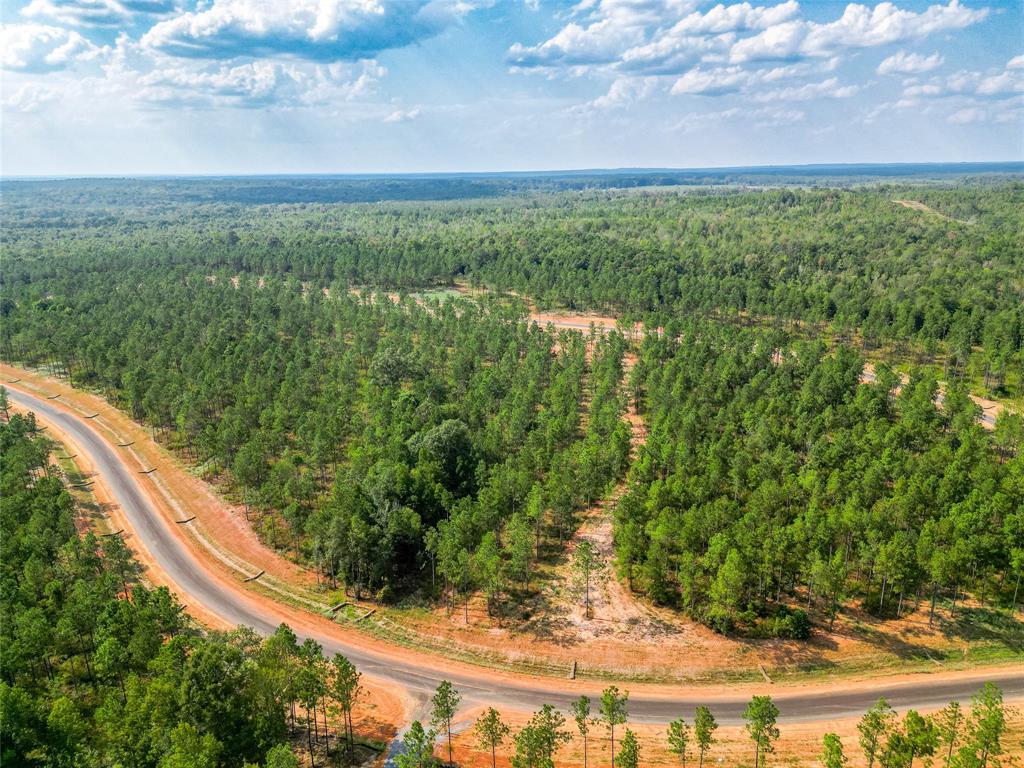 233 Millwood Loop, Unit 17 Minden, LA 71055 - Photo 13 of 17 a view of a yard with an outdoor seating