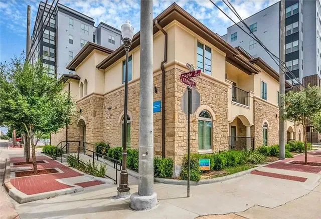 a view of a building with a street