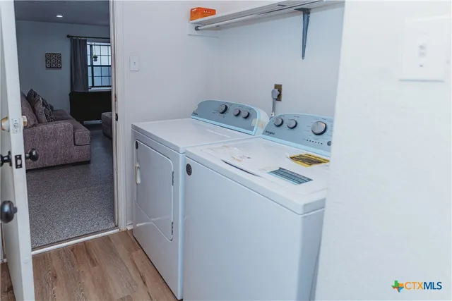 a utility room with dryer and washer