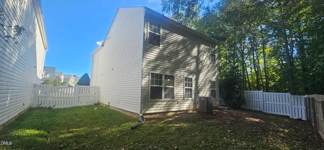 a view of a back yard of the house