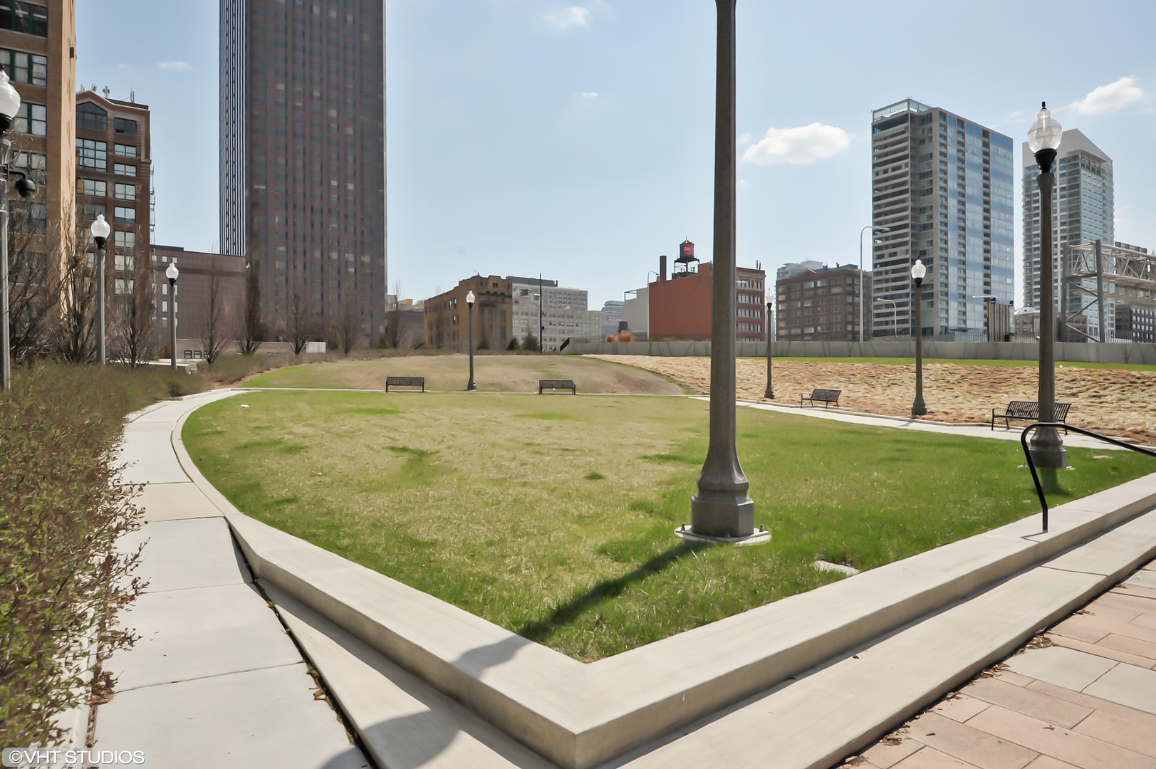 235 West Van Buren Street, Unit 1622 Chicago, IL 60607 - Photo 24 of 29 a view of a swimming pool with lawn chairs