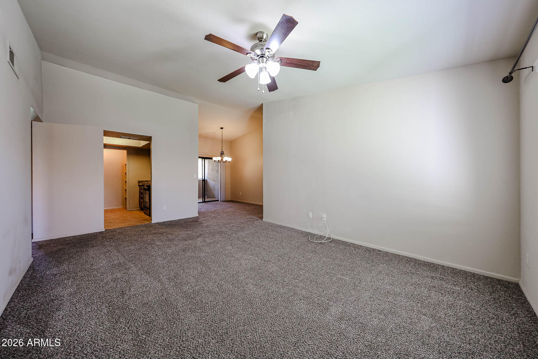 1402 East Guadalupe Road, Unit 216 Tempe, AZ 85283 - Photo 4 of 24 Family room into kitchen