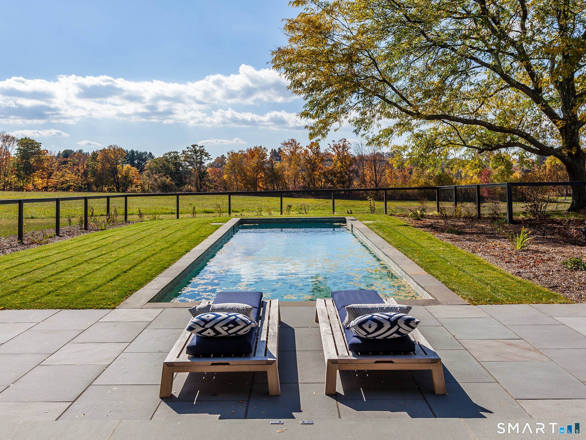 79 East Street Washington, CT 06793 - Photo 20 of 40 a view of swimming pool with seating area