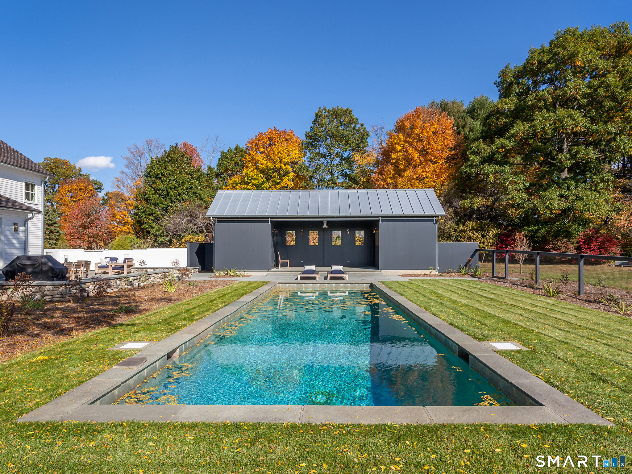 79 East Street Washington, CT 06793 - Photo 21 of 40 a view of a house with a yard
