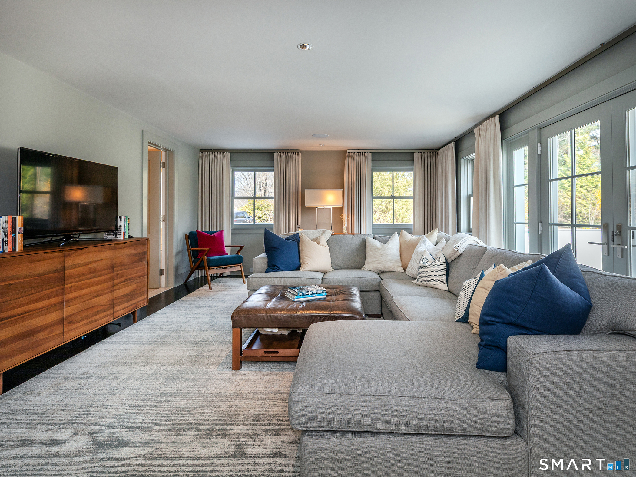 79 East Street Washington, CT 06793 - Photo 24 of 40 a living room with furniture and a flat screen tv