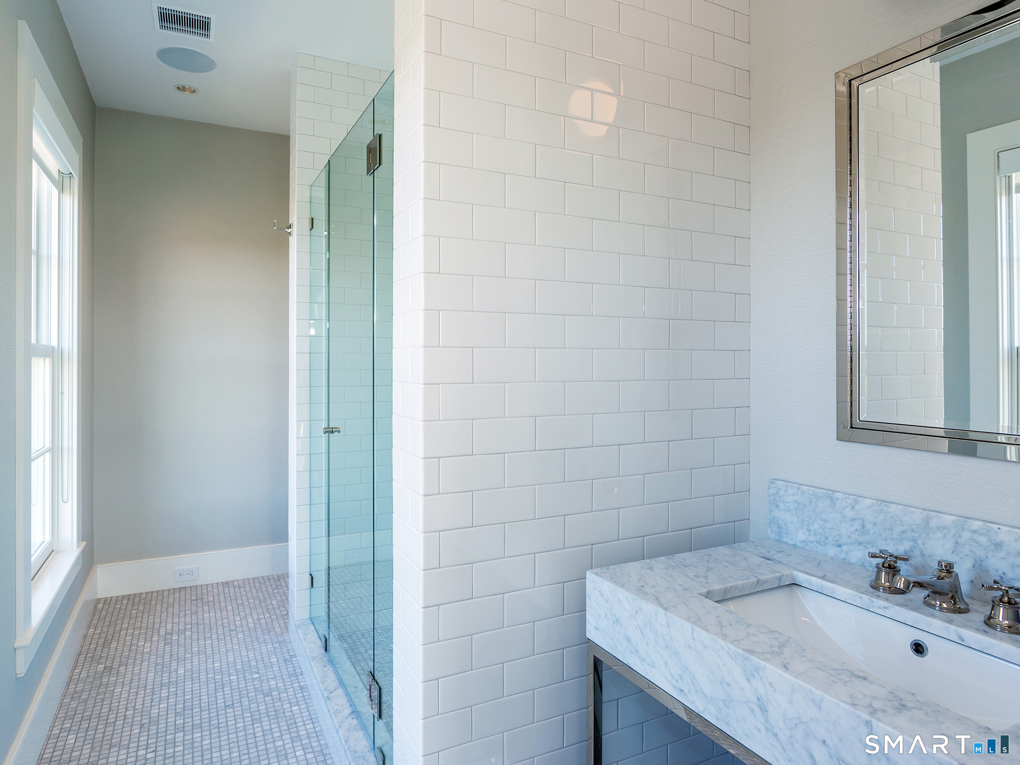 79 East Street Washington, CT 06793 - Photo 32 of 40 a bathroom with a granite countertop sink and a mirror
