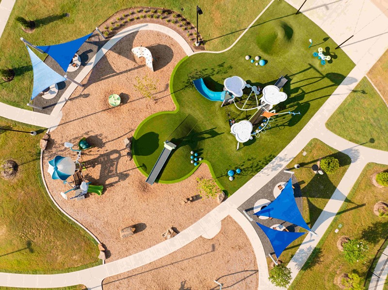 1600 Del Sol Rdg Lane Katy, TX 77493 - Photo 25 of 28 Enjoy family-friendly living at Sunterra, where thoughtfully designed playgrounds and shaded play areas create the perfect space for kids to explore and connect. Resort-style amenities like this highlight why Sunterra is one of Katy, Texas’s most sought-after master-planned communities for modern families.