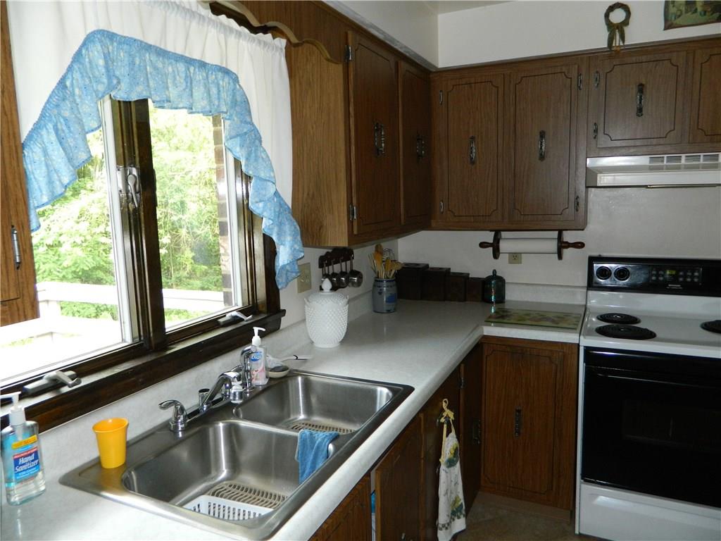 113 Iseman Road Freeport, PA 16229 - Photo 10 of 25 Kitchen window outlooks the back yard and double bowl stainless sink