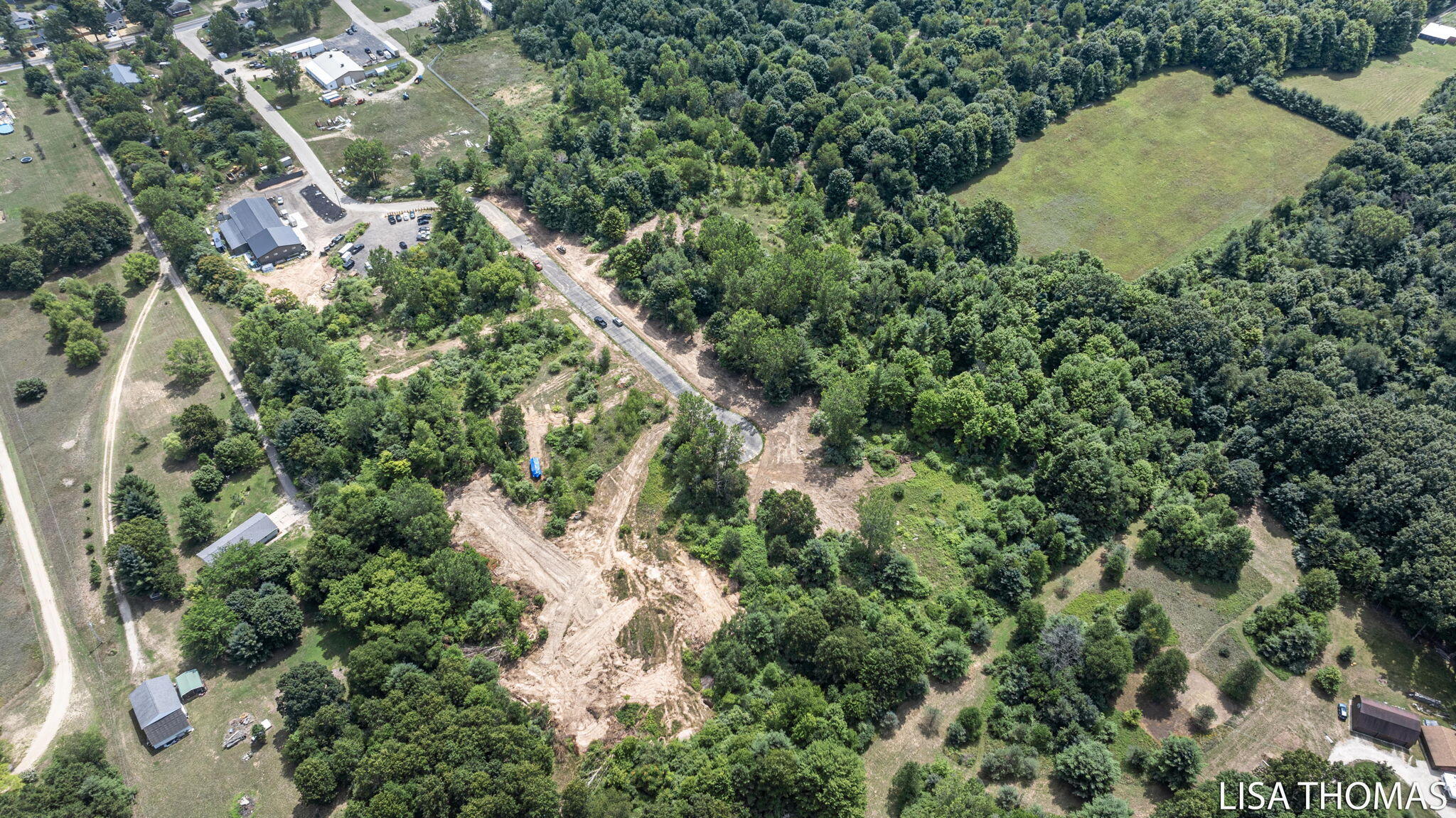 168 Toby Road Northwest Sparta, MI 49345 - Photo 4 of 8 3-web-or-mls-DJI_20250728131148_0536_D