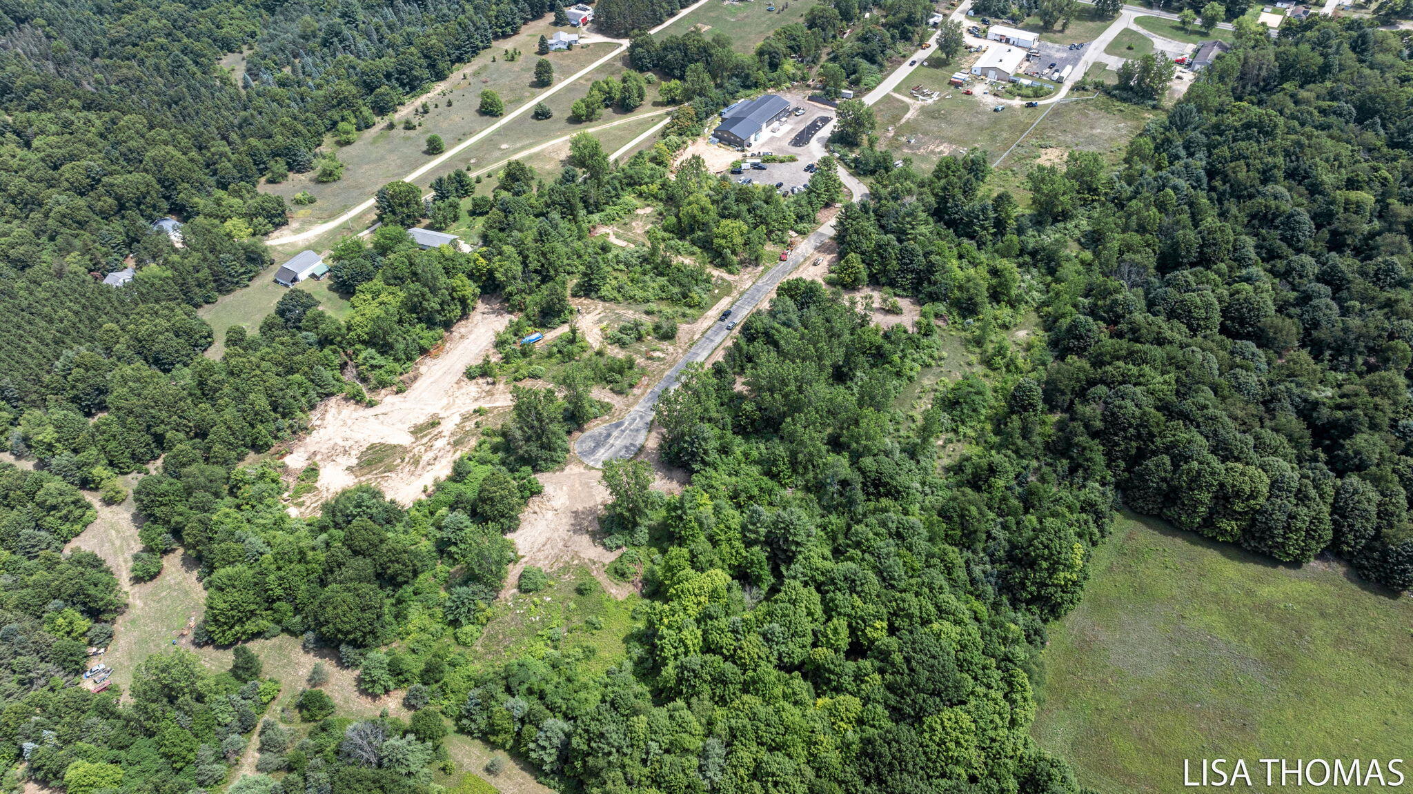 168 Toby Road Northwest Sparta, MI 49345 - Photo 5 of 8 4-web-or-mls-DJI_20250728131119_0533_D