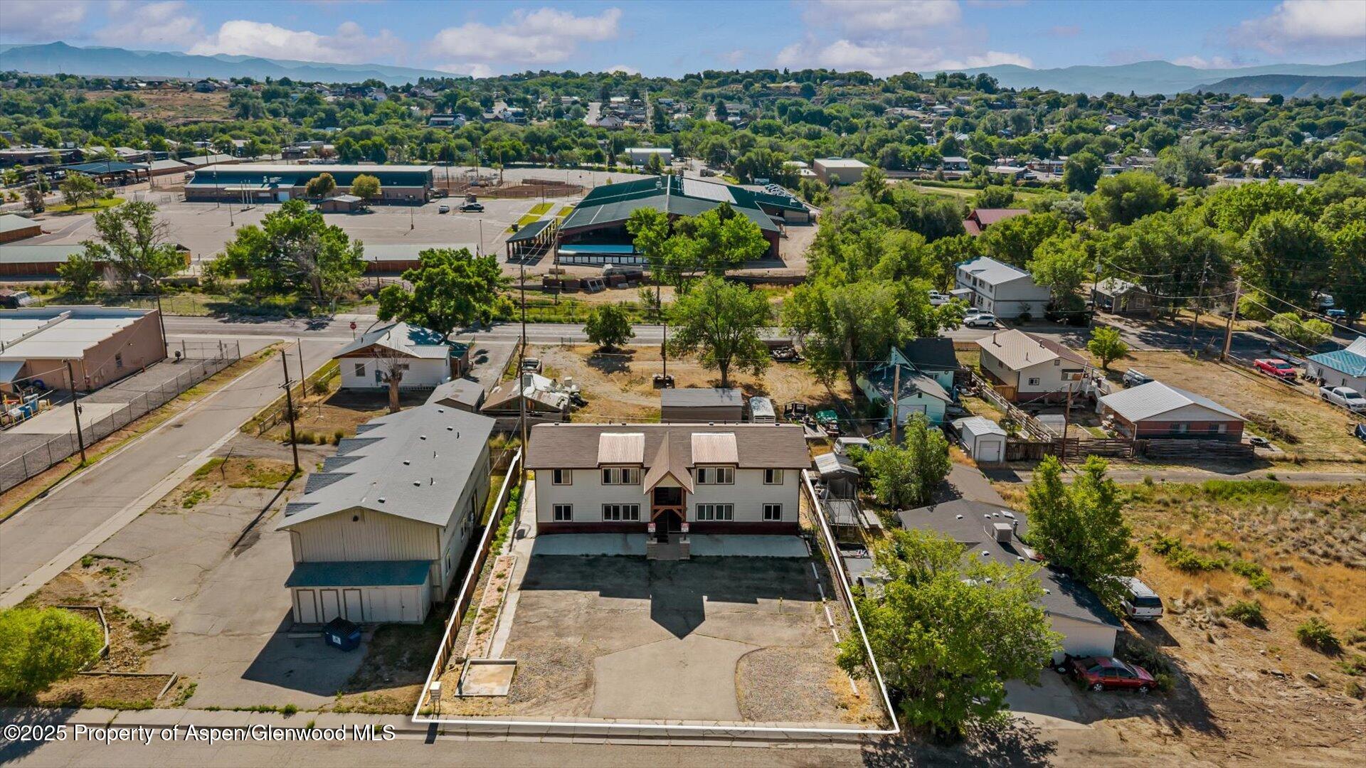 1014 Stillwell Avenue Rifle, CO 81650 - Photo 13 of 13 an aerial view of residential houses with outdoor space