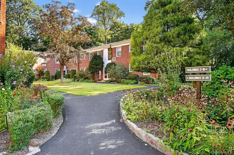 a view of a house with a garden