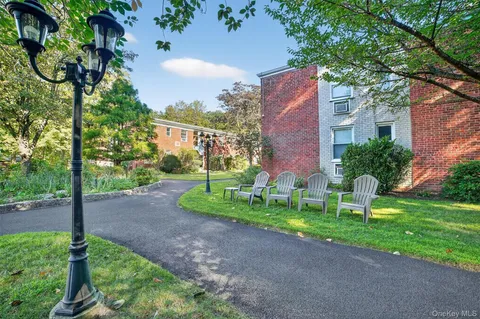 a view of a house with a street
