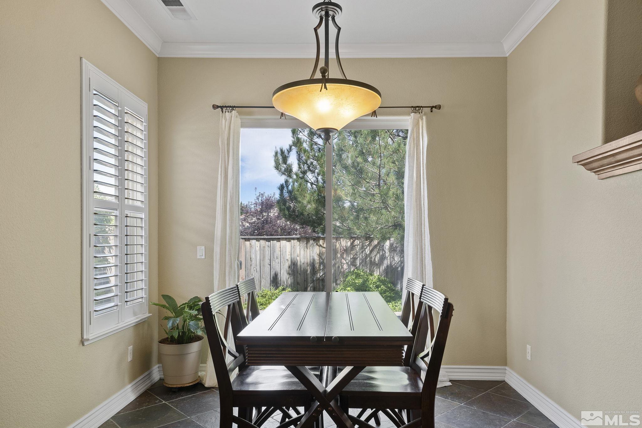 10080 Goler Wash Court Reno, NV 89521 - Photo 15 of 40 a dining room with furniture and window